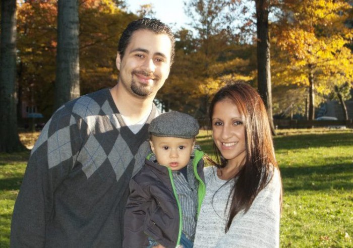 parents with toddler smiling