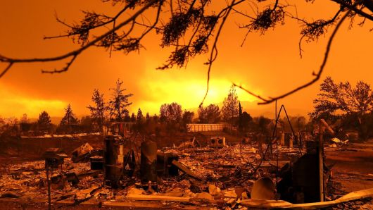 Wildfire debris of where a house once stood
