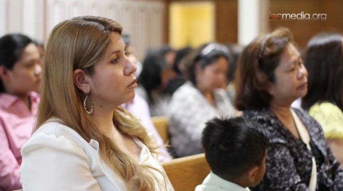 woman listening in a worship service