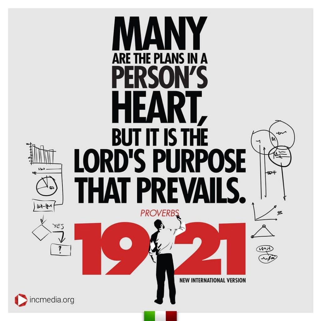 4. Proverbs 19:21 with man writing.