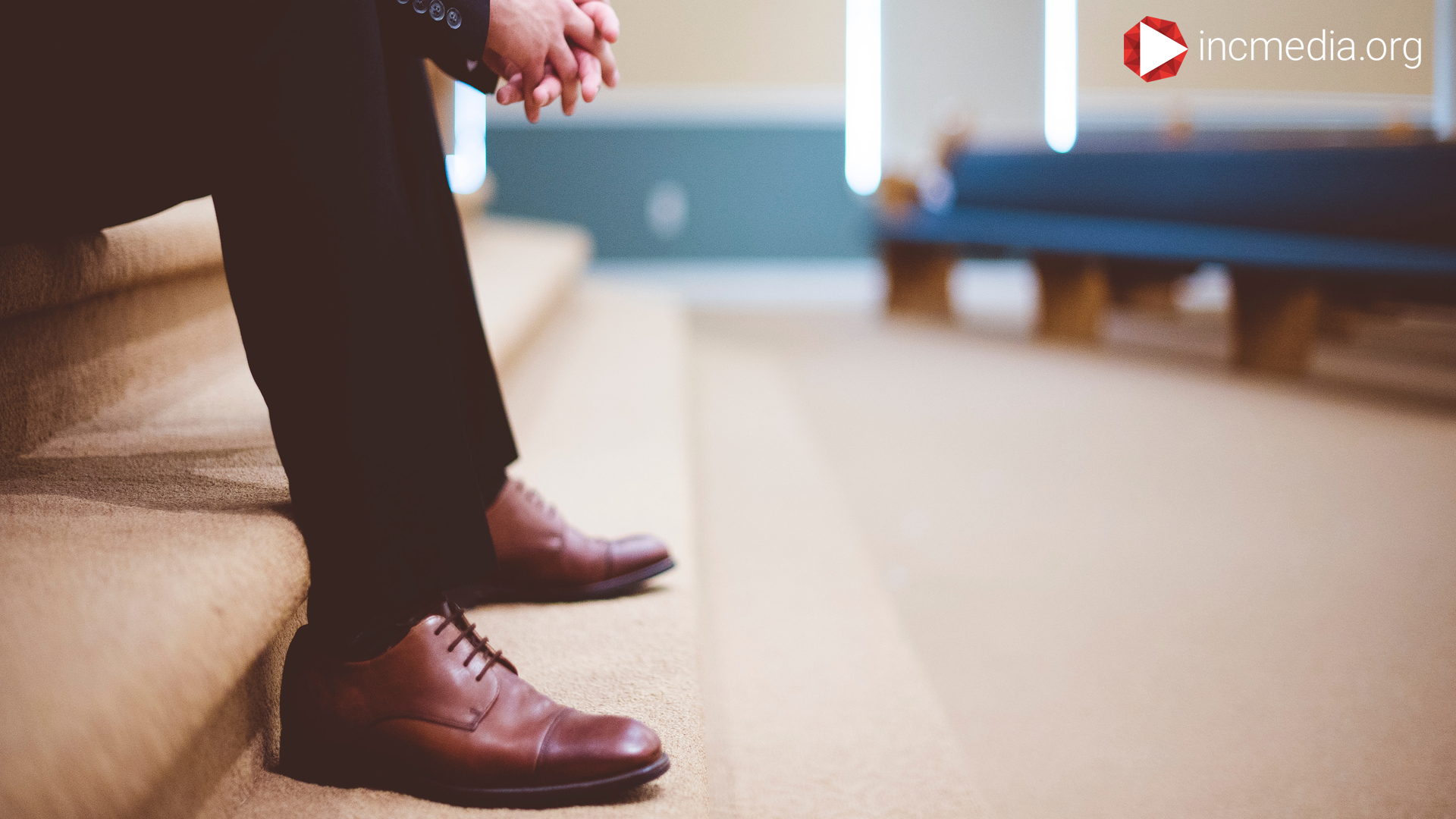man-shoes-inside-church-building
